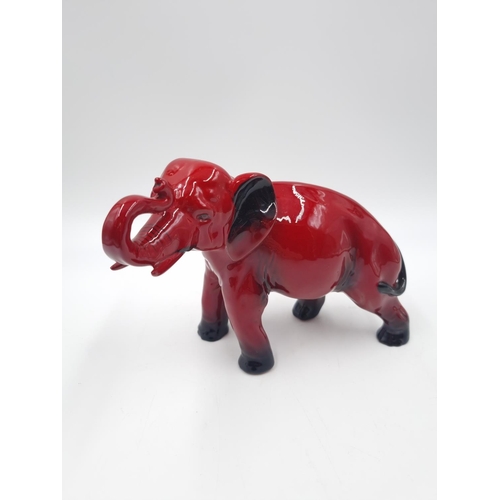 450 - A Royal Doulton Flambé elephant figurine - approx. 13.5cm x 18cm long