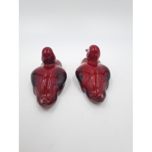 452 - Two Royal Doulton Flambé resting duck figurines - approx. 4cm high x 8cm long