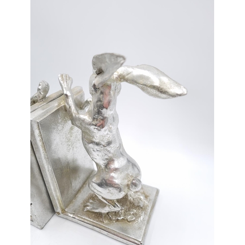 462 - A pair of silver tone hare bookends - approx. 24cm high x 13.5cm wide x 10cm deep