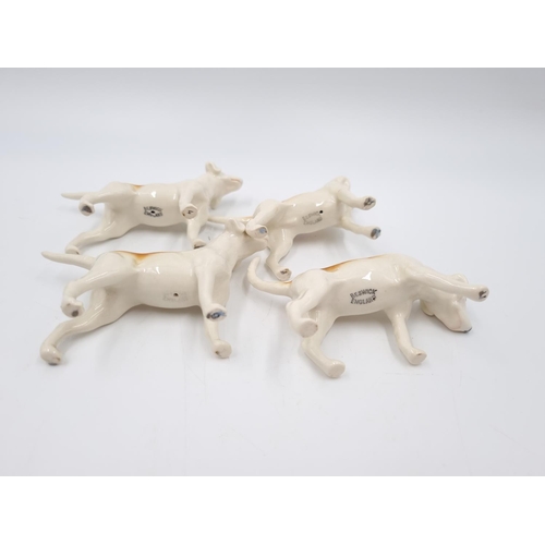 466 - Six Beswick figurines, four fox hounds and two foxes