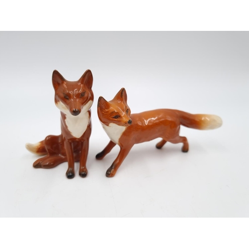 466 - Six Beswick figurines, four fox hounds and two foxes