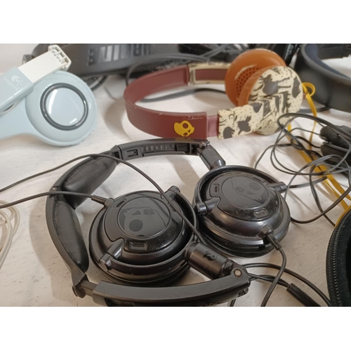 1308 - A large collection of headphones to include eCandy, Skull Candy, JVC, Panasonic RP-WF950H wireless, ... 