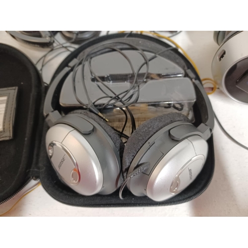 1308 - A large collection of headphones to include eCandy, Skull Candy, JVC, Panasonic RP-WF950H wireless, ... 