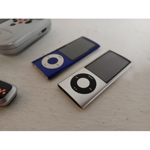 1310 - A collection of personal media players to include Apple iPod Nano, Pure pocketDAB 1500 DAB radio, Pa... 