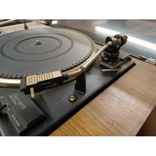 1324 - An Hitachi SDT-7820R stereo music centre comprising Garrard two speed turn table, Dolby cassette dec... 