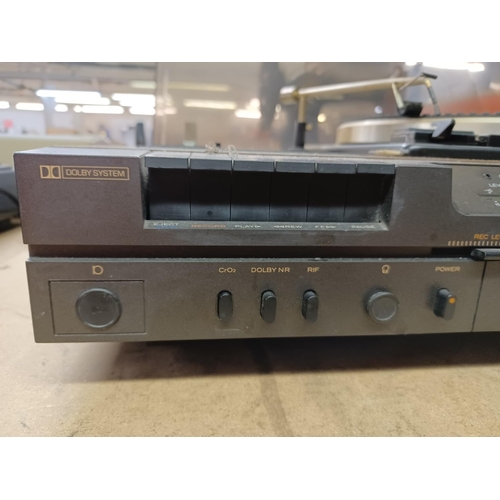 1324 - An Hitachi SDT-7820R stereo music centre comprising Garrard two speed turn table, Dolby cassette dec... 