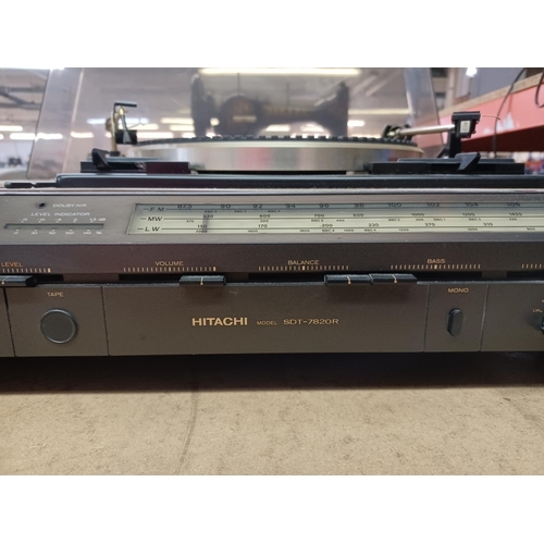 1324 - An Hitachi SDT-7820R stereo music centre comprising Garrard two speed turn table, Dolby cassette dec... 