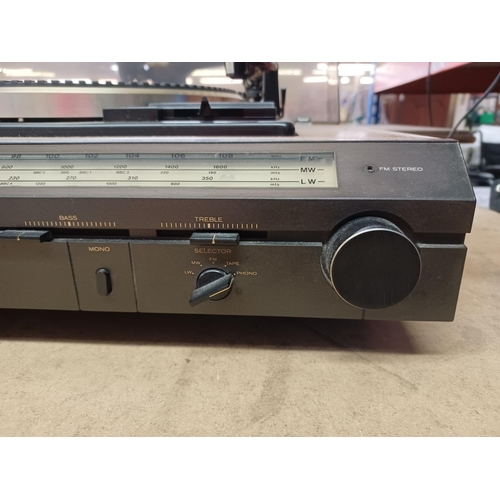 1324 - An Hitachi SDT-7820R stereo music centre comprising Garrard two speed turn table, Dolby cassette dec... 