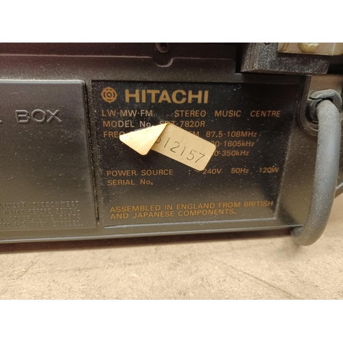 1324 - An Hitachi SDT-7820R stereo music centre comprising Garrard two speed turn table, Dolby cassette dec... 