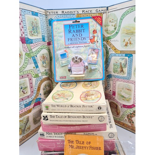 614 - A collection of Beatrix Potter toys and games to include The World Of Beatrix Potter Lift & Look Pla... 