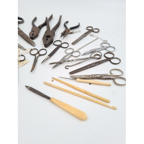 629 - A collection of antique and vintage scissors and pliers