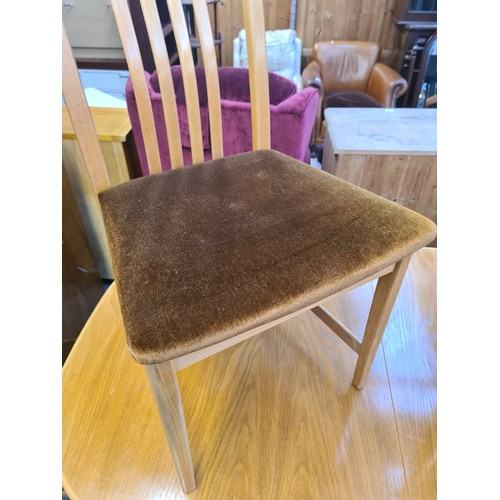 1031 - A 1970s McIntosh teak extending dining table with six matching chairs