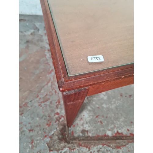 1141 - A mid 20th century teak rectangular coffee table with glass insert - approx. 40cm high x 107cm wide ... 