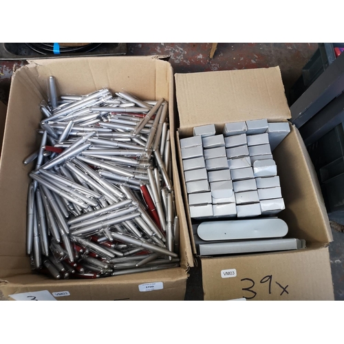 1720 - Two boxes containing assorted stationary to include approx. 405 new metal ball point pens and approx... 