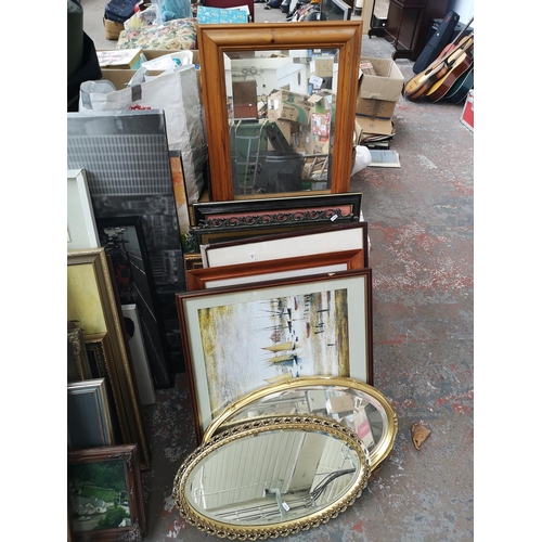 1724 - A large collection of assorted framed mirrors, paintings and prints to include oval and rectangular ... 