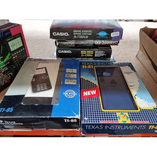 1403 - Seven boxed scientific calculators to include Casio FC-100 financial consultant, Casio FX-770GB grap... 