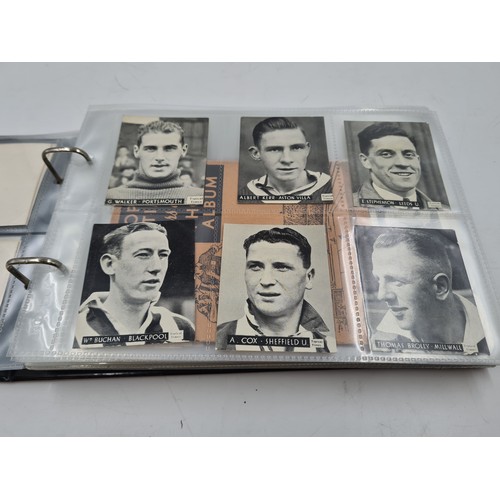 586 - A collection of vintage cigarette cards and photographs to include 1930s Topical Times Stars of Toda... 