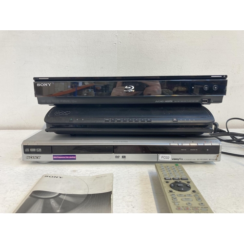 1326 - Three items, one Sony BDP-S560 blu-ray/DVD player, one Sony RDR-GX120 DVD recorder with remote contr... 