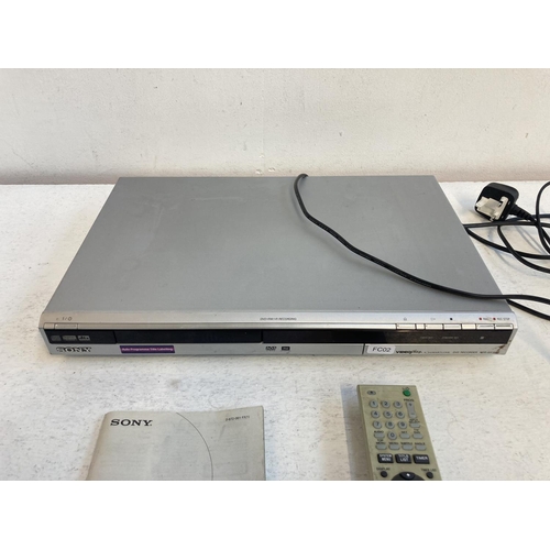 1326 - Three items, one Sony BDP-S560 blu-ray/DVD player, one Sony RDR-GX120 DVD recorder with remote contr... 