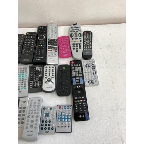 1340 - A collection of remote controls to include Philips, Panasonic, Bush, LG, Humax, Sky etc.