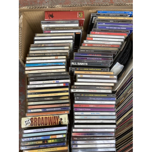 1354 - Two boxes containing a large collection of CDs