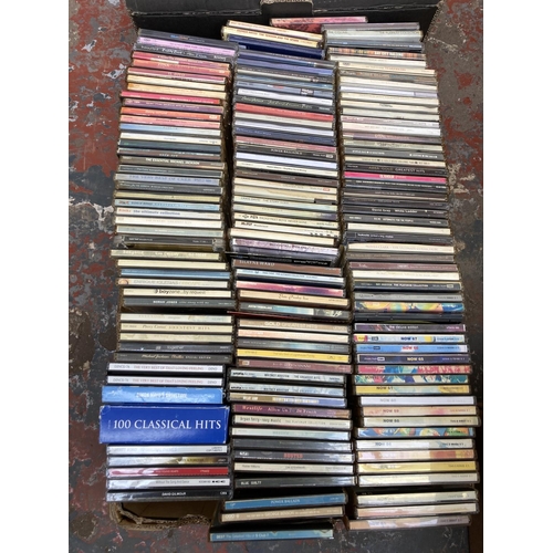 1354 - Two boxes containing a large collection of CDs