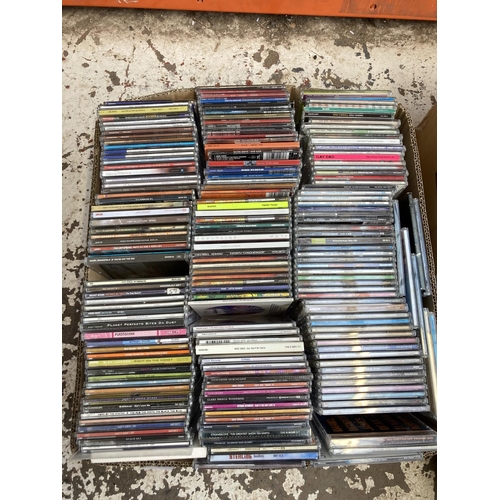 1356 - Three boxes containing a large collection of CDs and CD singles