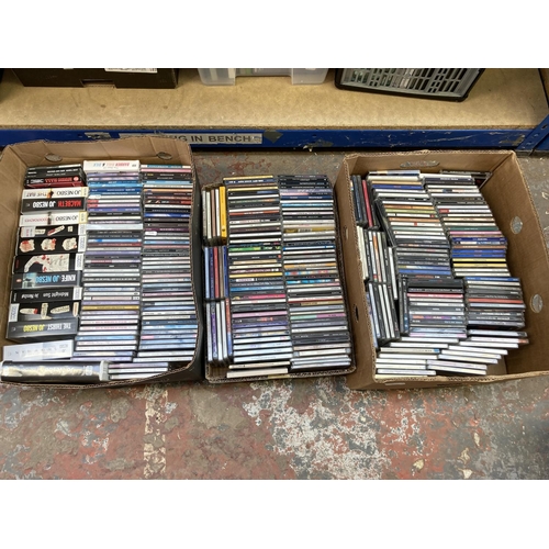 1357 - Three boxes containing a large collection of CDs