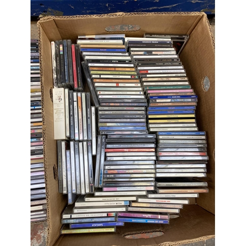 1357 - Three boxes containing a large collection of CDs