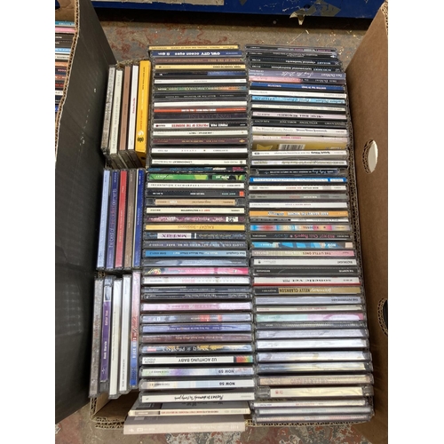 1357 - Three boxes containing a large collection of CDs