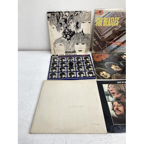 1369 - Nine LP vinyl records by The Beatles to include 'White Album' second pressing (No. 0109980), 'Please... 