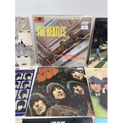 1369 - Nine LP vinyl records by The Beatles to include 'White Album' second pressing (No. 0109980), 'Please... 