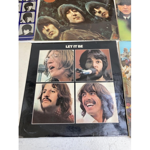 1369 - Nine LP vinyl records by The Beatles to include 'White Album' second pressing (No. 0109980), 'Please... 