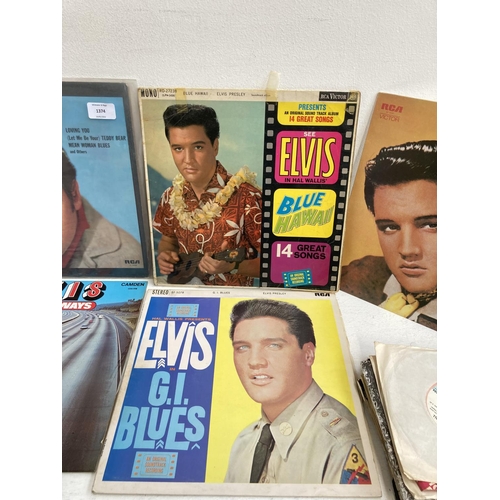 1374 - A collection of Elvis Presley LP vinyl records and assorted 7