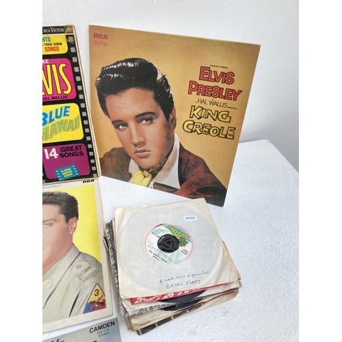 1374 - A collection of Elvis Presley LP vinyl records and assorted 7