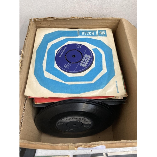 1375 - Two boxes of vinyl records, one containing 7