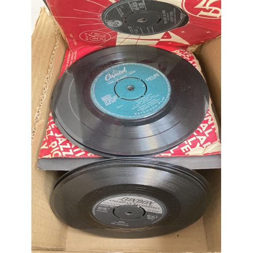 1375 - Two boxes of vinyl records, one containing 7