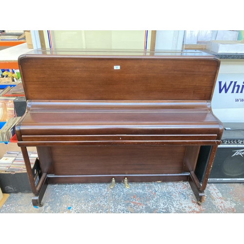 1382 - A Squire upright piano