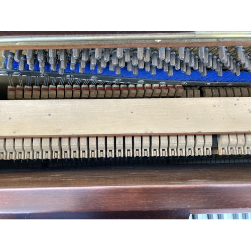 1382 - A Squire upright piano