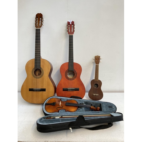 1384 - Four musical instruments, one full sized classical guitar, one three quarter classical guitar, one c... 