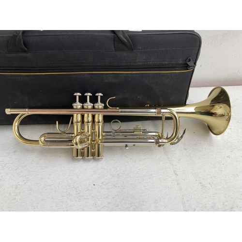 1389 - A cased Vincent Bach International Elkhart 100TR student trumpet