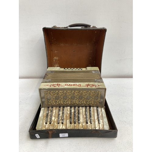 1390 - A cased Pietro twelve bass piano accordion