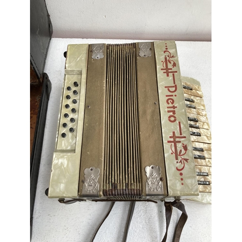 1390 - A cased Pietro twelve bass piano accordion