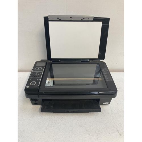 1394 - An Epson Stylus SX405 computer printer