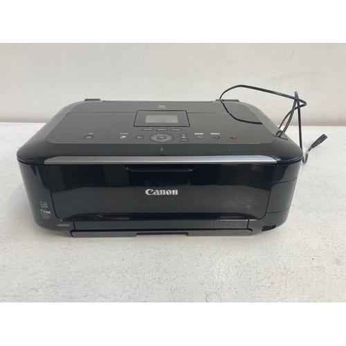 1395 - A Canon MG5350 computer printer