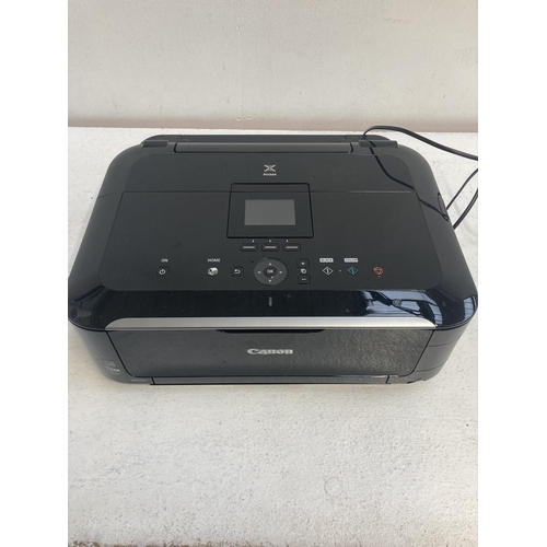 1395 - A Canon MG5350 computer printer