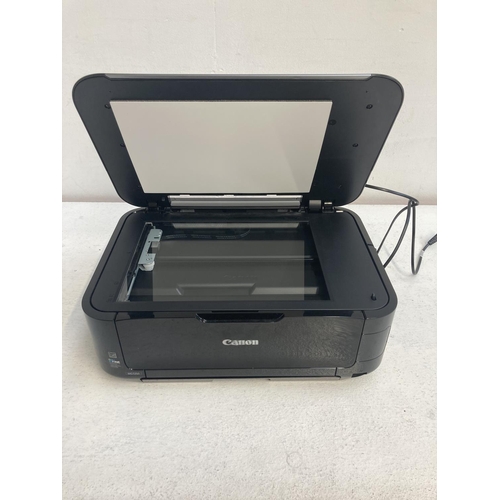 1395 - A Canon MG5350 computer printer