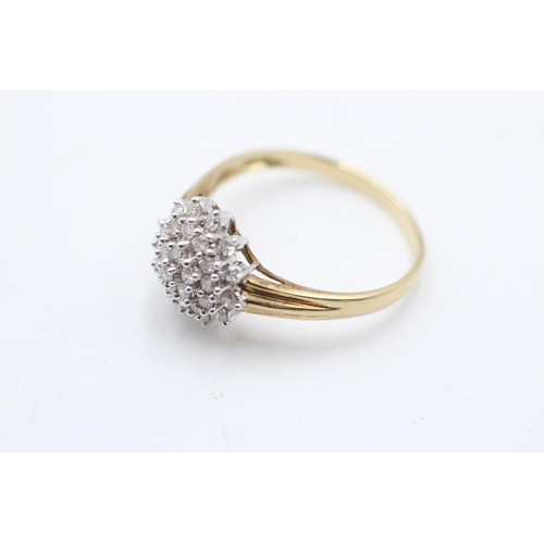 111 - A 9ct gold diamond cluster dress ring, size T - approx. gross weight 2.6 grams