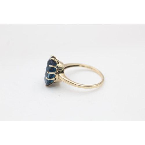 114 - A 9ct gold topaz solitaire cocktail ring, size P½ - approx. gross weight 3.7 grams