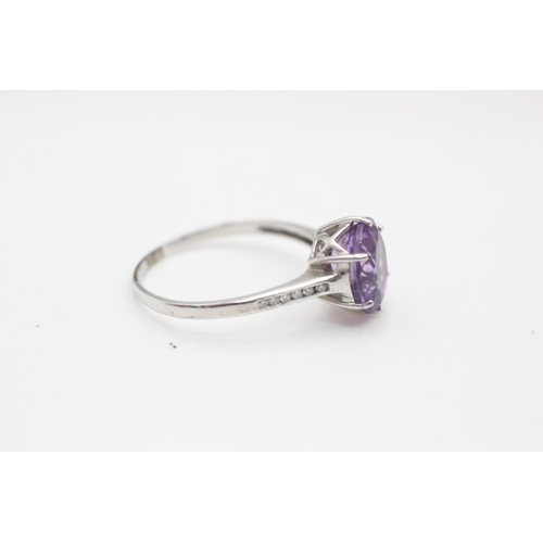 116 - A 9ct white gold amethyst and diamond dress ring, size V - approx. gross weight 3.3 grams